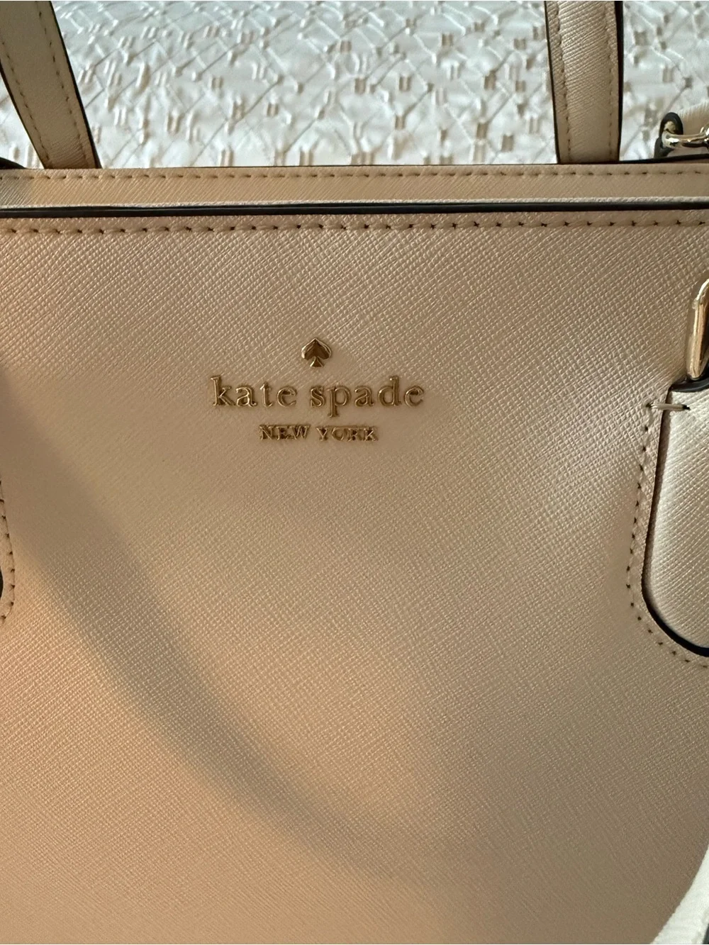 NWOT Kate Spade cream colored pebbled leather satchel